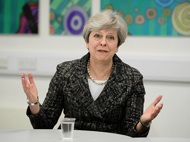 MAIDENHEAD, ENGLAND - APRIL 21: Prime Minster Theresa May talks to students and first-time