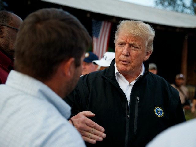 President Donald Trump meets with farmers impacted by Hurricane Michael, Monday, Oct. 15, 2018, in Macon, Ga.