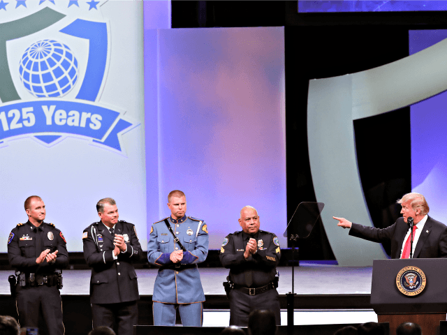President Donald Trump, far right, recognizes the Target Police officer of the year finali