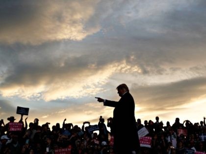President Donald Trump arrives as the sun sets to speak at a campaign rally at Minuteman A