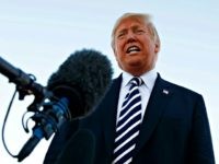 Trump Rally Nevada President Donald Trump speaks to media before boarding Air Force One at Elko Regional Airport, Saturday, Oct. 20, 2018, in Elko, Nev., after a campaign rally.