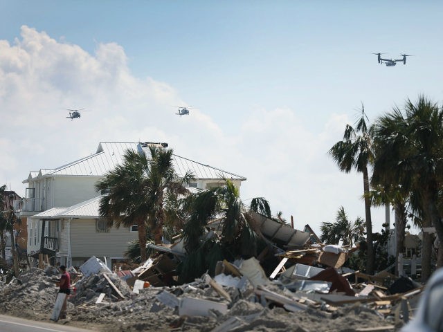 President Donald Trump makes a flyover as he tours the devastation caused by Hurricane Mic