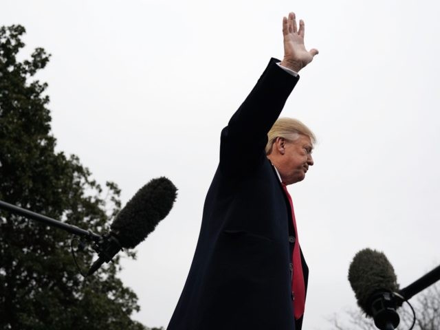 Trump waves at press (Alex Wong / Getty)