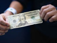 andrew-jackson-20-dollar-bill-usd-getty A member of a group of 228 immigrants deported from the United States shows a 20-dollar bill before exchanging it upon arrival at the Air Force base in Guatemala City on January 10, 2018. In 2017, the first year of the government of President Donald Trump, 32,833 Guatemalans were deported …