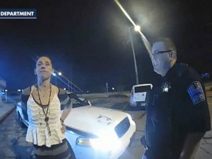 WATCH: Handcuffed Woman Slips Out of Cuffs, Steals Patrol Car