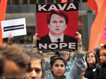 Activists and advocates for survivors of sexual abuse gather in the Federal Building Plaza to protest the confirmation of Supreme Court nominee Brett Kavanaugh on September 28, 2018 in Chicago, Illinois. Today the Senate Judiciary Committee voted out Supreme Court nominee Judge Brett Kavanaugh and agreed to an additional week …