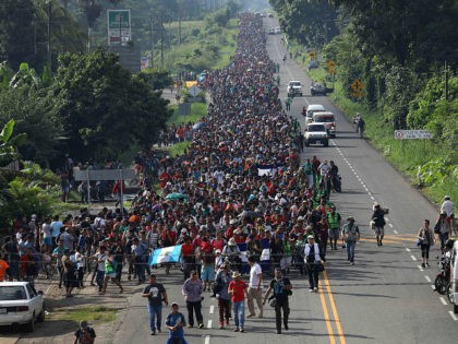 CIUDAD HIDALGO, MEXICO - OCTOBER 21: A migrant caravan, which has grown into the thousands, walks into the interior of Mexico after crossing the Guatemalan border on October 21, 2018 near Ciudad Hidalgo, Mexico The caravan of Central Americans plans to eventually reach the United States. U.S. President Donald Trump …