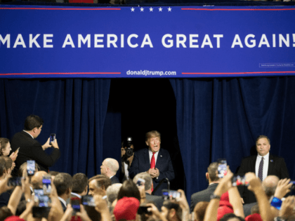 President Donald Trump greets the crowd during a campaign rally at Freedom Hall on October 1, 2018 in Johnson City, Tennessee. President Trump held the rally to support Republican senate candidate Marsha Blackburn. (Photo by Sean Rayford/Getty Images) Editorial subscription SML 3000 x 2000 px | 25.40 x 16.93 cm …