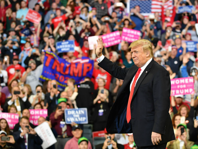 US President Donald Trump arrives to speak at a 'Make America Great Again' rally at the Mid-America Center in Council Bluffs, Iowa on October 9, 2018. (Photo by MANDEL NGAN / AFP) (Photo credit should read MANDEL NGAN/AFP/Getty Images)