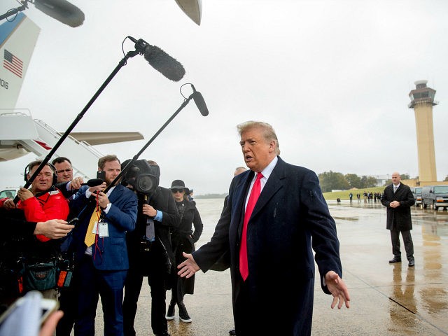 President Donald Trump speaks to reporters about a shooting at a Pittsburgh synagogue as h