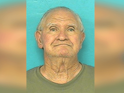 Douglas Ferguson, 76, was trying to attack his son with a running chainsaw as the younger man mowed the lawn at a home on U.S. Highway 421 back on June 28, according to a police statement obtained by the Bristol Herald-Courier.