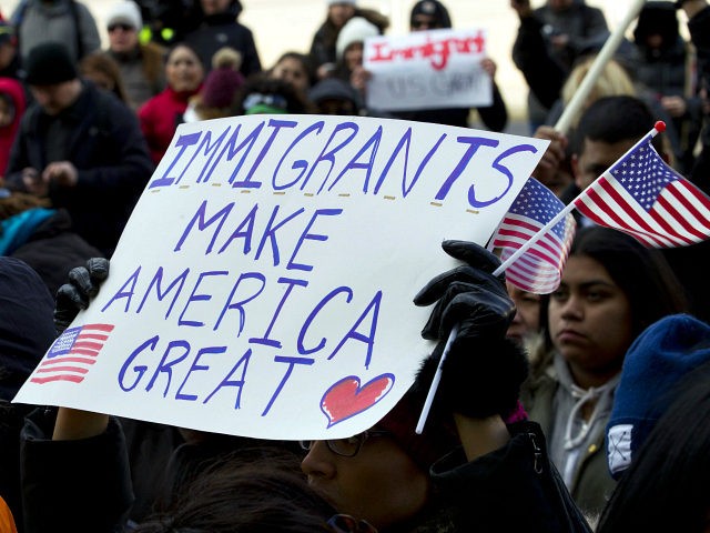 Supporters of immigrants' rights march in downtown Washington during an immigration protest Thursday, Feb. 16, 2017, in Washington. Immigrants around the U.S. stayed home from work and school Thursday to demonstrate how important they are to America's economy, and many businesses closed in solidarity, in a nationwide protest called A …