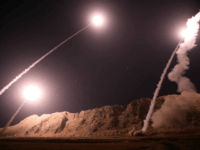 In this photo released on Monday, Oct. 1, 2018, by the Iranian Revolutionary Guard, missiles are fired from city of Kermanshah in western Iran targeting the Islamic State group in Syria. Iran's paramilitary Revolutionary Guard said Monday it launched ballistic missiles into eastern Syria targeting militants it blamed for a …