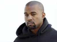 kanye-west-640x480-2015-getty American rapper Kanye West poses before Christian Dior 2015-2016 fall/winter ready-to-wear collection fashion show on March 6, 2015 in Paris. AFP PHOTO / PATRICK KOVARIK (Photo credit should read PATRICK KOVARIK/AFP/Getty Images)