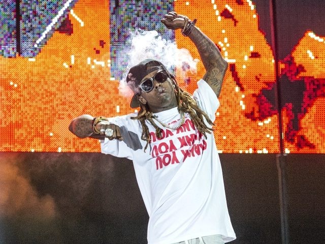 Lil Wayne performs at the Lil' WeezyAna Fest at Champions Square on Friday, Aug. 25,