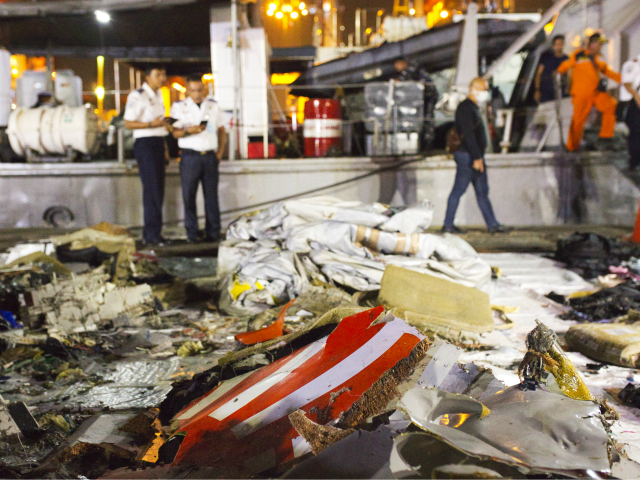 Wreckage from Lion Air flight JT 610 lies at the Tanjung Priok port on October 29, 2018 in Jakarta, Indonesia. Lion Air Flight JT 610 crashed shortly after take-off with no sign so far of survivors among the 189 people on board the plane. (Photo by Ed Wray/Getty Images)