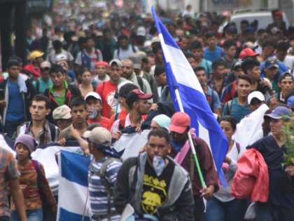 Honduran migrants take part in a caravan towards the United States in Chiquimula, Guatemal