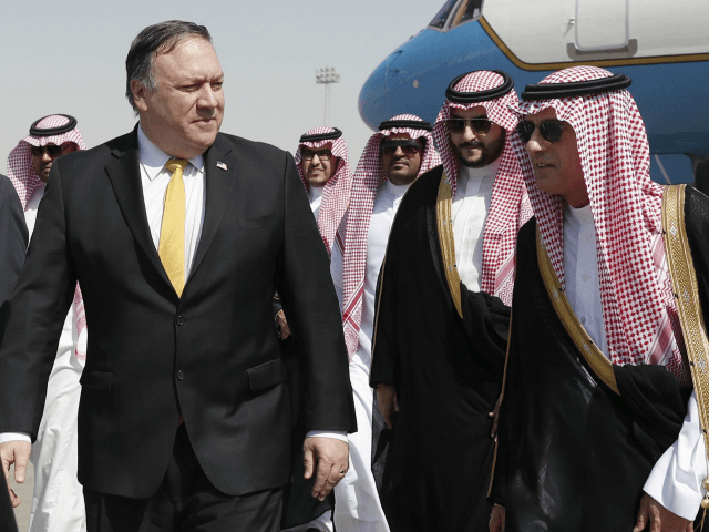 US Secretary of State Mike Pompeo (L) walks alongside Saudi Foreign Minister Adel al-Jubei