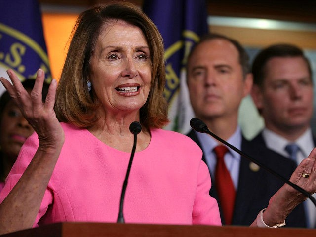 WASHINGTON, DC - JULY 17: House Minority Leader Nancy Pelosi (D-CA) speaks during a news conference with Democratic members of the House Intelligence Committee about the Trump-Putin Helsinki summit in the U.S. Capitol Visitors Center July 17, 2018 in Washington, DC. Past and present members of the committee were very …