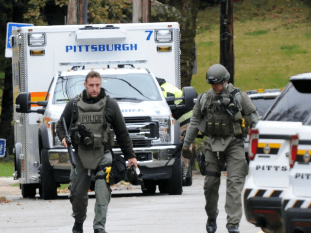 Pittsburgh police officers depart the scene of the mass shooting at the Tree of Life Synagogue in the Squirrel Hill neighborhood of Pittsburgh where 11 people died Saturday. Photo by Archie Carpenter/UPI