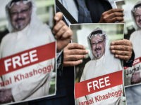 TOPSHOT - Protestors hold pictures of missing journalist Jamal Khashoggi during a demonstration in front of the Saudi Arabian consulate on October 8, 2018 in Istanbul. - Jamal Khashoggi, a veteran Saudi journalist who has been critical towards the Saudi government has gone missing after visiting the kingdom's consulate in &hellip;