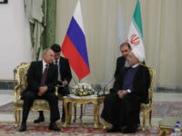 russia iran Russian President Vladimir Putin (L) and Iranian President Hassan Rouhani meet in Teheran on September 7, 2018. - The presidents of Iran, Russia and Turkey meet in Tehran for a summit set to decide the future of Idlib province amid fears of a humanitarian disaster in Syria's last major rebel …