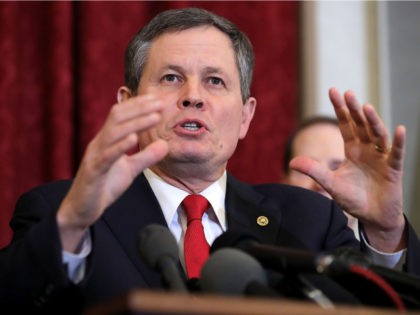 Sen. Steve Daines (R-MT) speaks during a news conference about proposed reforms to the Foreign Intelligence Surveillance Act in the Russell Senate Office Building on Capitol Hill January 16, 2018 in Washington, DC. Daines is part of a bipartisan group of senators that supports legislation they say would protect Americans …