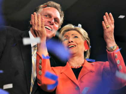 Then-Sen. Hillary Rodham Clinton and then-campaign chairman Terry McAuliffe celebrate at C