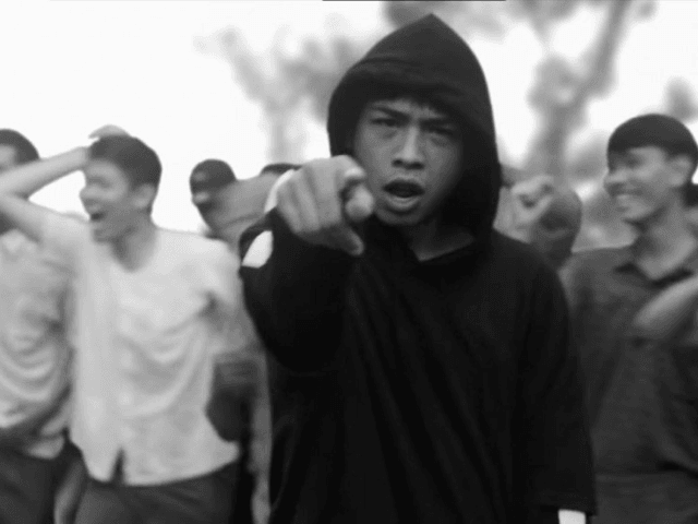 A group of Thai rappers has touched a nerve with an impassioned and now-viral music video in which they drop fiery rhymes about the ruling junta. Police are considering filing charges against the lyricists.