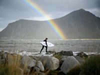 Norwegian surfer Anker Olsen Frantzen, 17, prepares for the Lofoten Masters 2018 surfing competition in the Arctic Circle Far from Rio sun, surfers brave Norway's Arctic swells