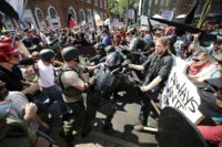 White nationalists, neo-Nazis and members of the 'alt-right clash with counter-protesters on August 12, 2017 in Charlottesville, Virginia