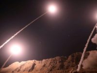 This handout photo provided by Iran's Revolutionary Guard official website via SEPAH News shows missiles being launched from an undisclosed location to target militants in eastern Syria early on October 1, 2018