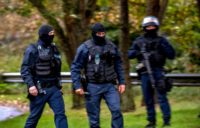 French police arrested three in a dawn raid on the Zahra Centre religious association at Grande Synthe near Dunkirk, one of France's biggest Shiite centres, citing terror prevention