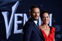 "Venom," which stars Tom Hardy (L) was met harshly by critics, but had a record opening weekend