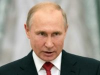 Russian President Vladimir Putin signed into law a bill that will gradually increase the state retirement age to 60 for women and 65 for men, in reforms that sparked public protests Russian President Vladimir Putin signed into law a bill that will gradually increase the state retirement age to 60 for women and 65 for men, in reforms that sparked public protests