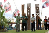 Former president of French Polynesia Oscar Temaru (L) speaks during a 2014 ceremony at a memorial dedicated to nuclear test victims in Papeete