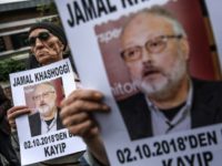 Protesters hold a portrait of missing journalist and Riyadh critic Jamal Khashoggi Protesters hold a portrait of missing journalist and Riyadh critic Jamal Khashoggi