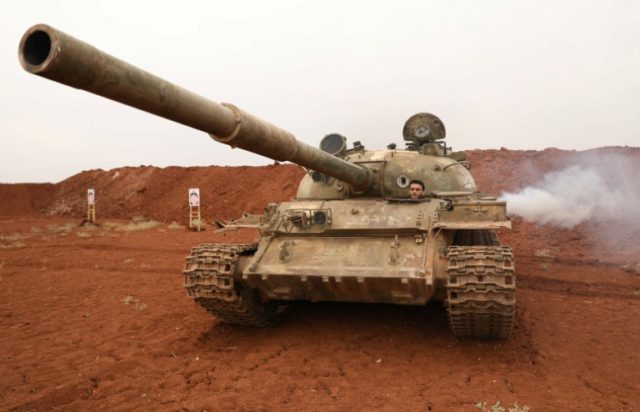 Turkey says heavy arms pullout completed in Syria's Idlib