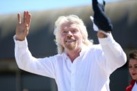 Richard Branson is suspending two directorships linked to tourism projects in Saudi Arabia and discussions with Saudi Arabia over proposed investment in Virgin Galactic