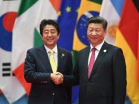 Japan PM Abe to make rare China visit this month