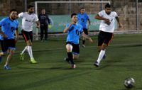 Inside Jerusalem's walled Old City, a month-long football tournament takes place in which the largest Palestinian families play each other to be dubbed champions of the city