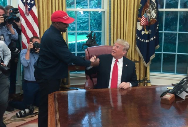 Kanye West hugs Trump, muses on presidential run