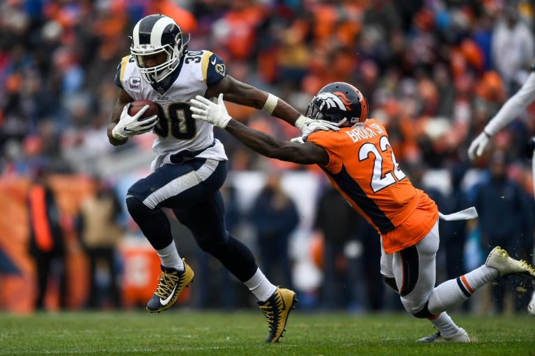 Los Angeles (AFP) – Todd Gurley rushed for a