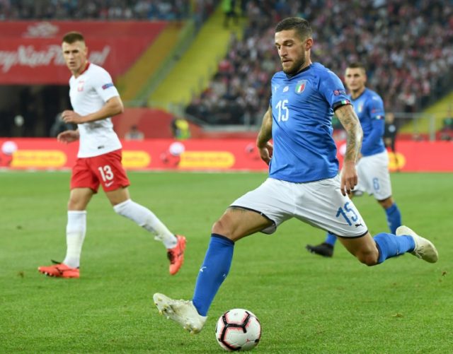 Last-gasp Biraghi saves Italy, gives Mancini first competitive win