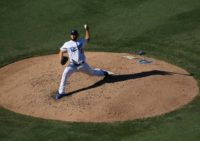 Dodgers ace Clayton Kershaw pitches during a 5-2 victory over the Milwaukee Brewers in game five of the National League Championship Series