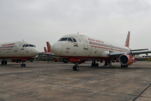Air hostess falls out of Indian plane, suffers injuries