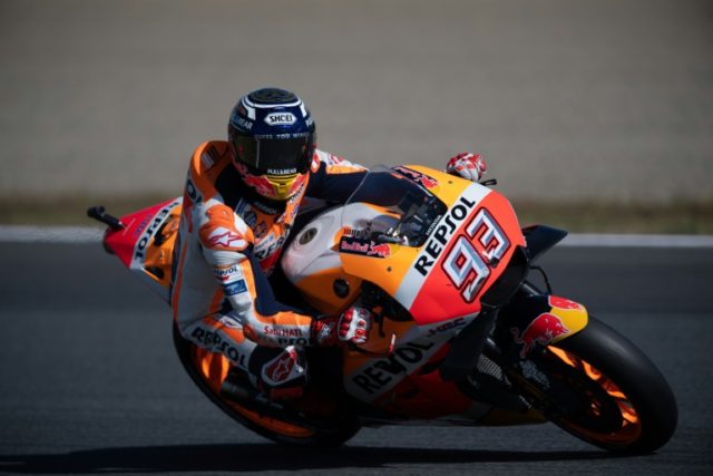 Honda's Marquez claims MotoGP title hat-trick in Japan
