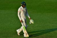 Usman Khawaja leaves the pitch after being dismissed by Muhammad Abbas during day one of the second Test against Pakistan in Abu Dhabi