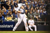 Jesus Aguilar drives in a run as the Milwaukee Brewers overpower the Los Angeles Dodgers to level their National League Championship Series on Friday