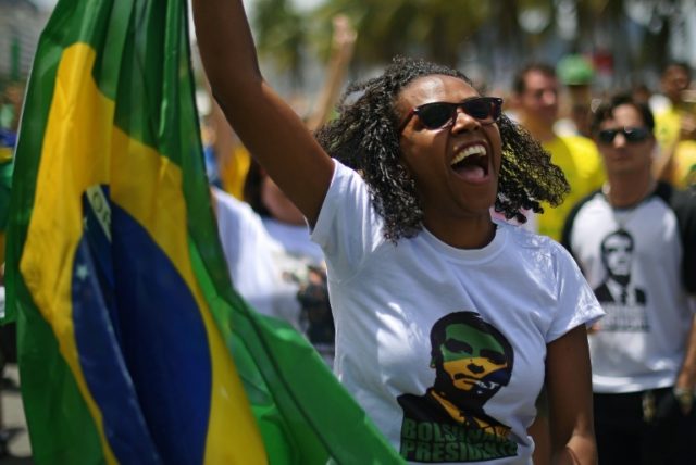 Gays, blacks still voting for Brazil's Bolsonaro despite rhetoric